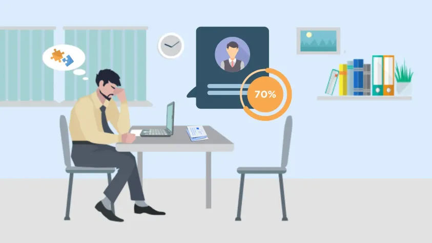 A man at a desk facing challenges with recruitment